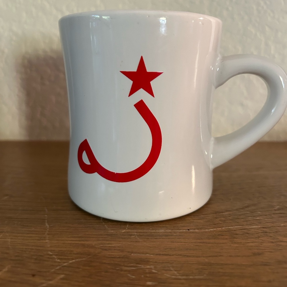 Stylish White Mug with Red Star Accent
